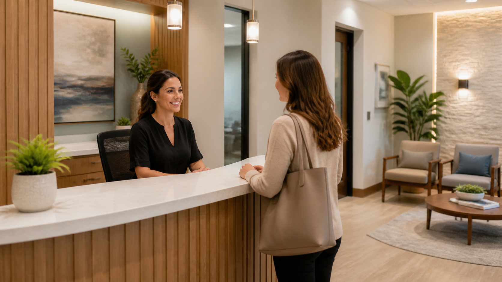 Welcoming dental practice reception with an orderly handoff conversation